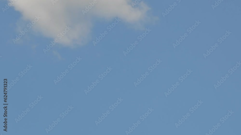 Time-lapse of fluffy clouds. Timelapse of the sky. Summer blue sky time lapse. Summer weather and blue sky. White clouds background. Cloud time-lapse, video loop. Time-lapse of fluffy clouds. Timelapse of the sky. Summer blue sky time lapse. Summer weather and blue sky. White clouds background. Cloud time-lapse, video loop.