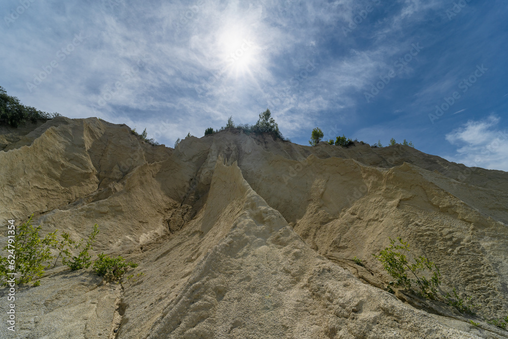 Limestone hills at the Rummu quarry on a hot summer day, Estonian nature. Limestone hills at the Rummu quarry on a hot summer day, Estonian nature.
