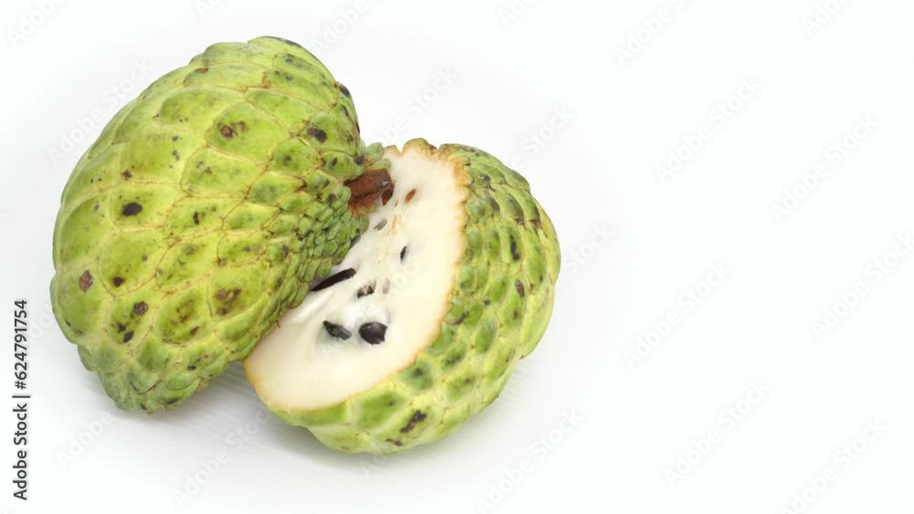 Sugar apple or custard apple with Half of custard apple and green leaf isolated on white background, exotic tropical Thai annona or cherimoya fruit, healthy food. Sugar apple or custard apple with Half of custard apple and green leaf isolated on white background, exotic tropical Thai annona or cherimoya fruit, healthy food.