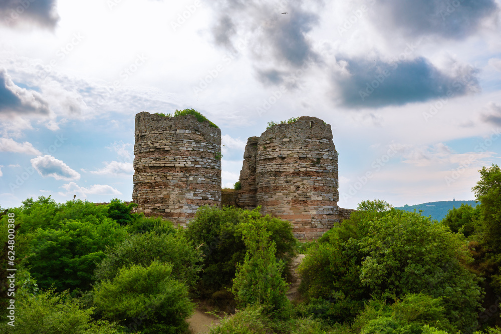 Yoros Castle and trees with cloudy sky. Ruins of a castle in Istanbul
