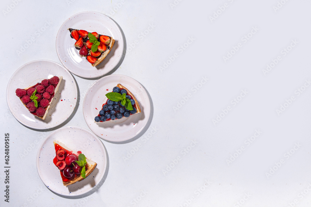 Summer cafe baking menu background, sweet cheesecake portion slices with various toppings, jam and berry fruits - strawberry, blueberry, raspberry, cherry
Summer cafe baking menu background, sweet cheesecake portion slices with various toppings, jam and berry fruits - strawberry, blueberry, raspberry, cherry