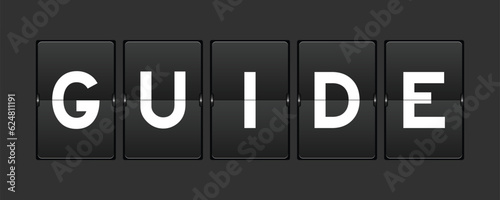 Black color analog flip board with word guide on gray background