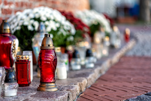 cemetery with flowers and grave candles