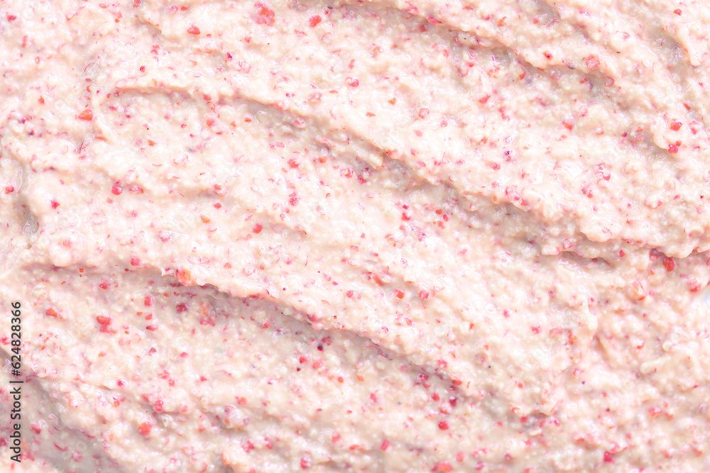 Creamy milk with pieces of fruit. Ice cream texture. Delicious sweet dessert close-up as a background. Creamy milk with pieces of fruit. Ice cream texture. Delicious sweet dessert close-up as a background.