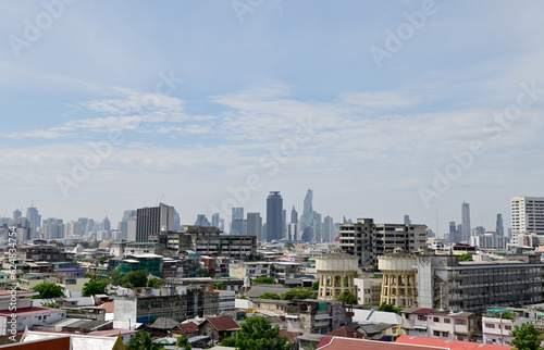 BANGKOK  THAILAND - July 22  2023   Landscape View of Bangkok City and Thai Buddhist Temple with Blue sky with white cloud. Clear day and good weather in the morning.