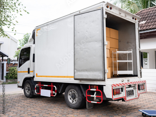 White shipping truck with parcel box