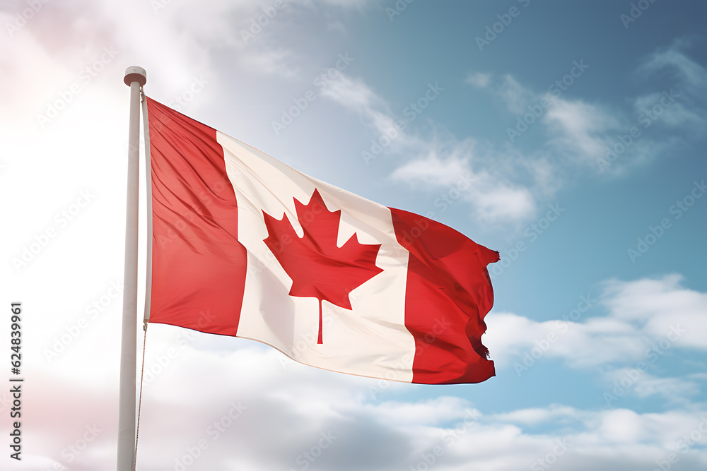 Canada flag waving in the wind on the blue sky Canada flag waving in the wind on the blue sky