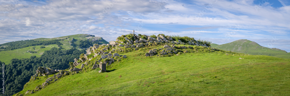 A small Statue of the Virgin Mary on the top of a m Pyrenees mountain ridge along the Way of Saint James