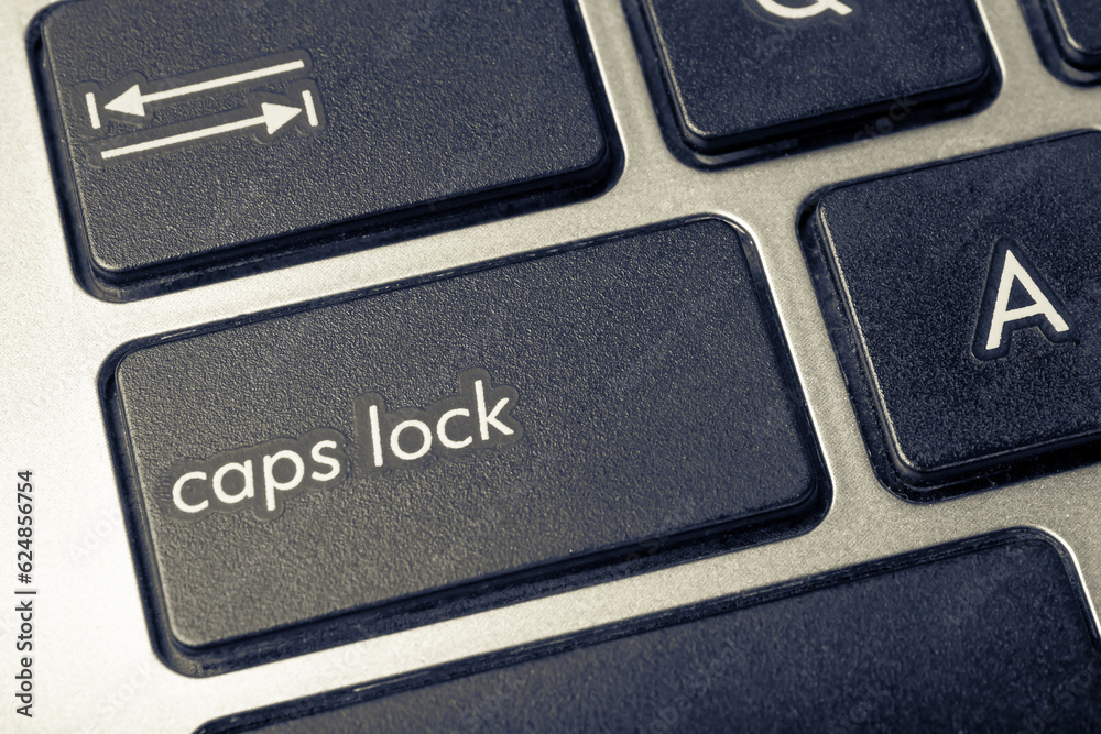 Caps lock button on the keyboard. Computer keyboard. Caps lock button on the keyboard. Computer keyboard.