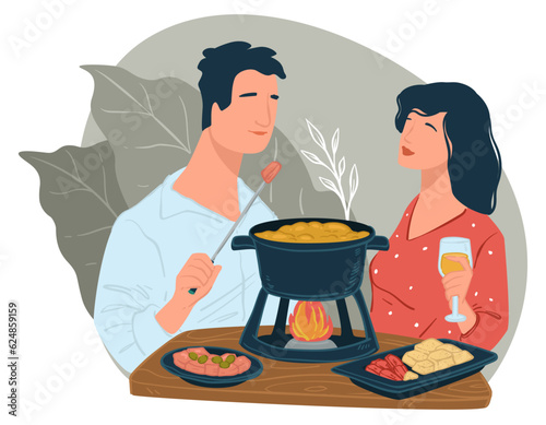Man and woman eating chinese hot pot in diner