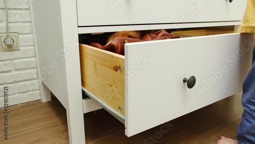 An accident can happen when a baby climbs onto a dresser to reach an item on top. Child safety is important when it comes to furniture placement in the home. Kid aged about two years