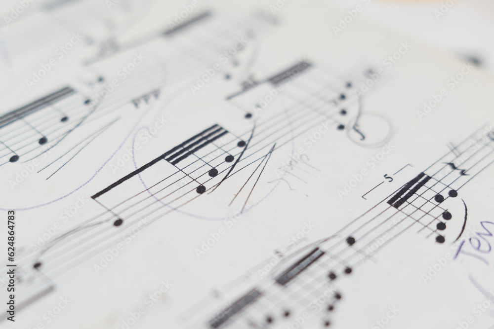 close up of musical notation and musical notes on a sheet of paper close up of musical notation and musical notes on a sheet of paper