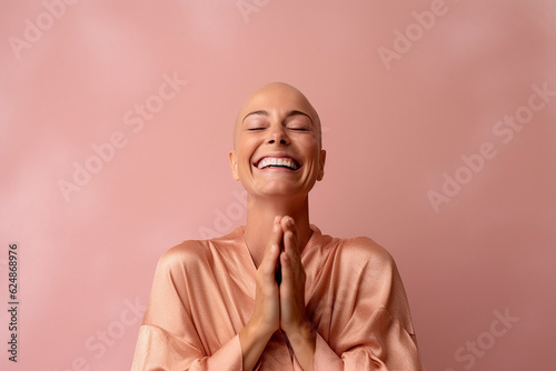 Woman smiles with her palms together photo