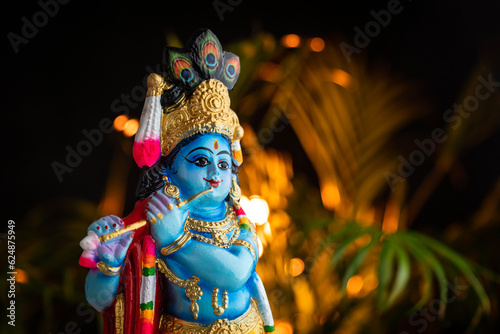 Lord Krishna with copy space for greeting text, Janmashtami and Vishukani concept background