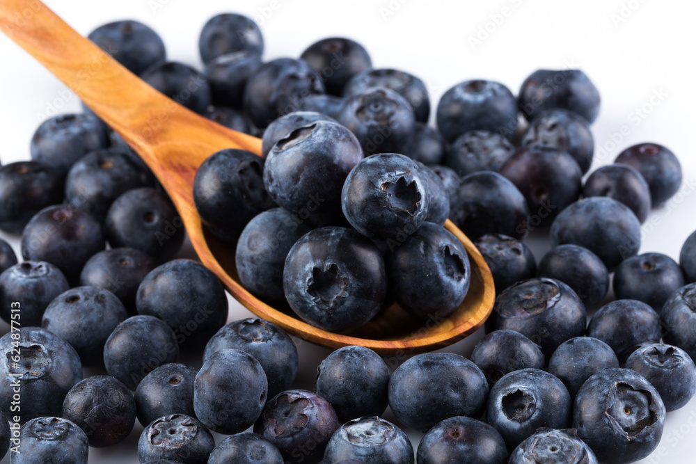 Fresh blueberries in wooden spoon Fresh blueberries in wooden spoon