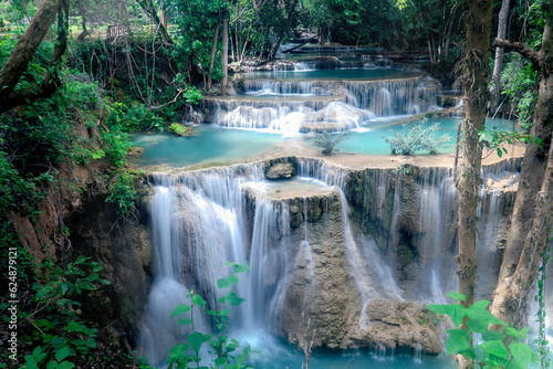 Beautiful nature Huai Mae Khamin waterfall in summer season  cataract falls in green rainforest  the large natural water resources in tropical jungle of Kanchanaburi province  Thailand.