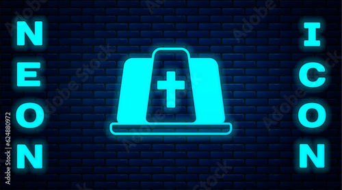 Glowing neon Pope hat icon isolated on brick wall background. Christian hat sign. Vector