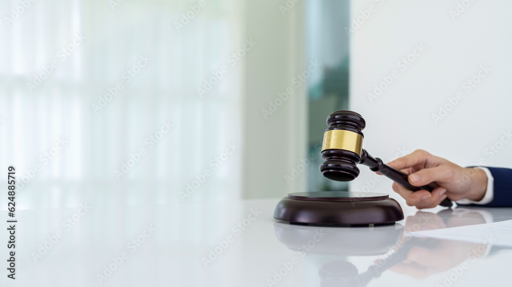 online auction concept, Hand holding auction hammer.. online auction concept, Hand holding auction hammer..