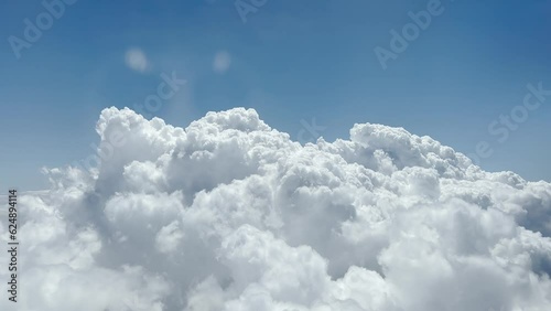 Close up shot of clouds from air. Landscape, realistic fluffy cumulus cloud. Sky, nobody and white heaven.