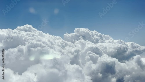 Close up shot of clouds from air. Landscape, realistic fluffy cumulus cloud. Sky, nobody and white heaven.