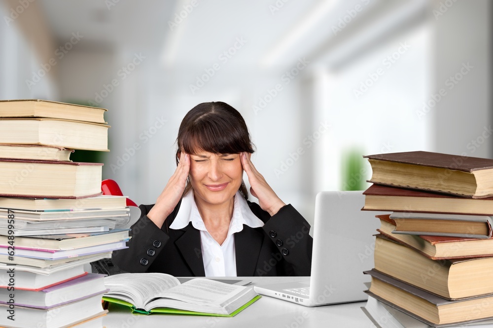 Business female working overtime in office Business female working overtime in office