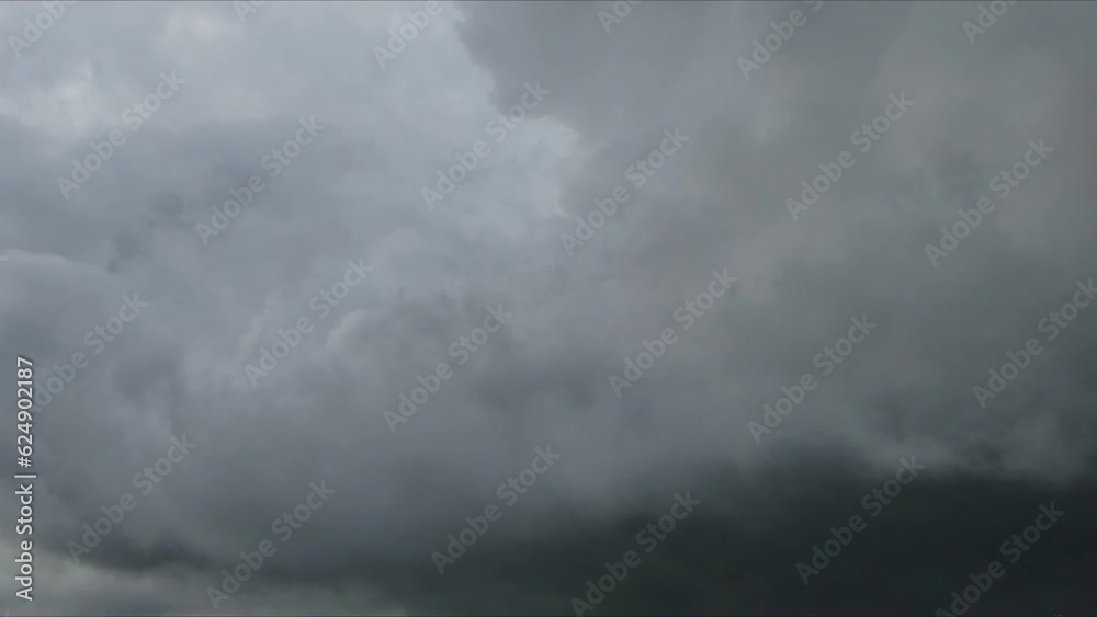 Abstract sky background with moving gray clouds on rainy day - timelapse. Topics: weather, meteorology, space, wind, air, atmosphere, spring, season. Abstract sky background with moving gray clouds on rainy day - timelapse. Topics: weather, meteorology, space, wind, air, atmosphere, spring, season.