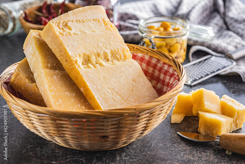 Tasty parmesan cheese in basket.