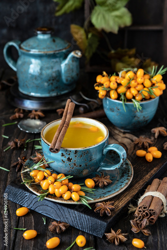 Sea buckthorn hot tea, autumn drinks concept