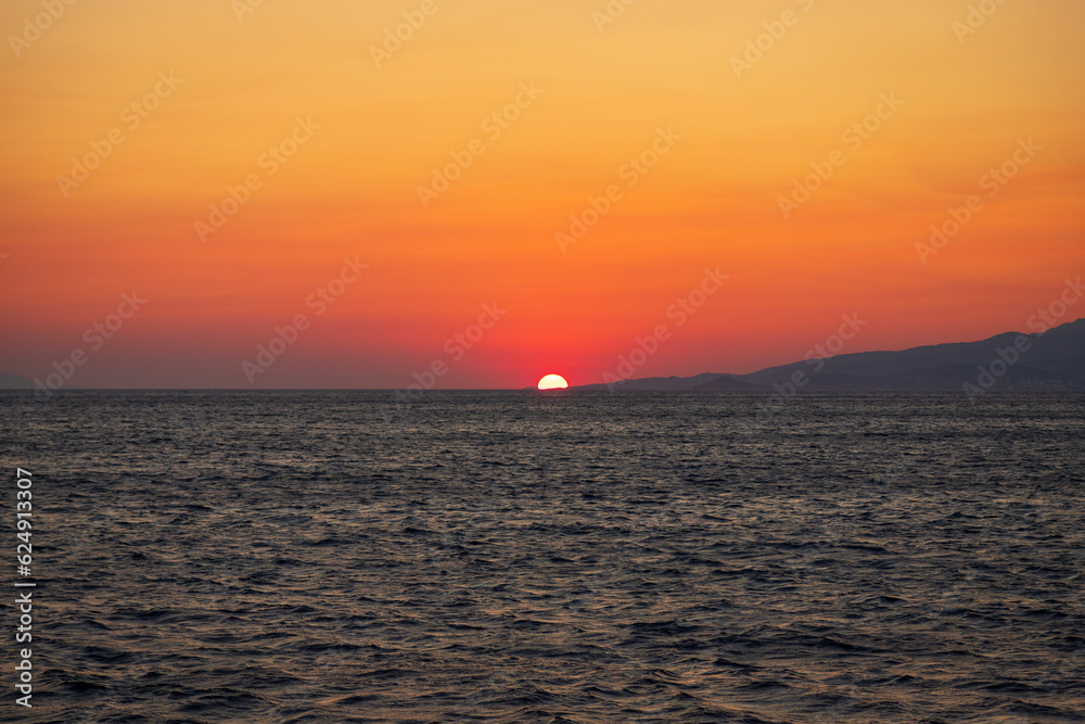 The sun setting over the Mediterranean sea