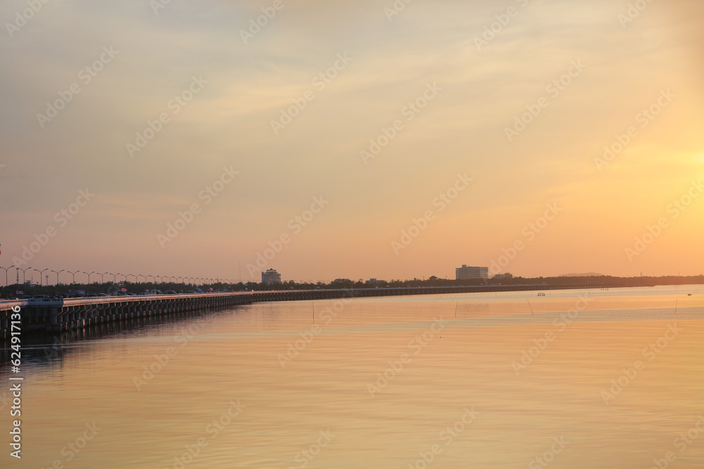 View of the bridge on the sea in the orange sky at Chonburi province  Thailand