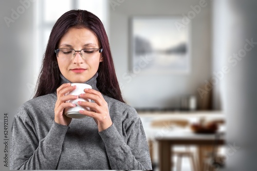 Young woman drink coffee at home