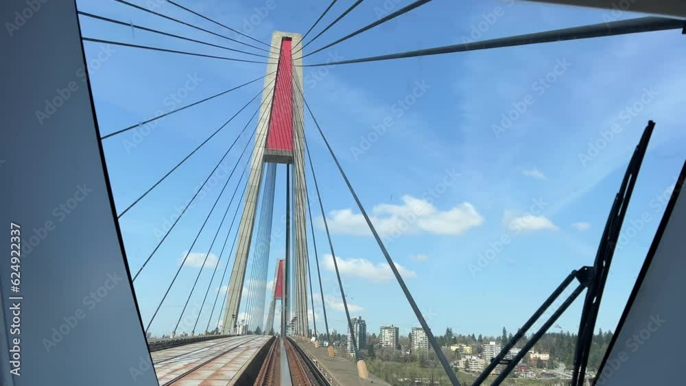 Skytrain Bridge in New Westminster and Surrey, Greater Vancouver, British Columbia, Canada. Sky. Brownsville Bar Park. High quality 4k footage Skytrain Bridge in New Westminster and Surrey, Greater Vancouver, British Columbia, Canada. Sky. Brownsville Bar Park. High quality 4k footage