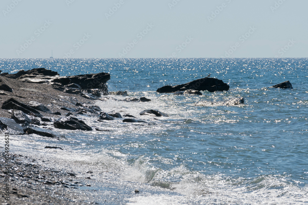 rocks on a beach in the mediterranean sea