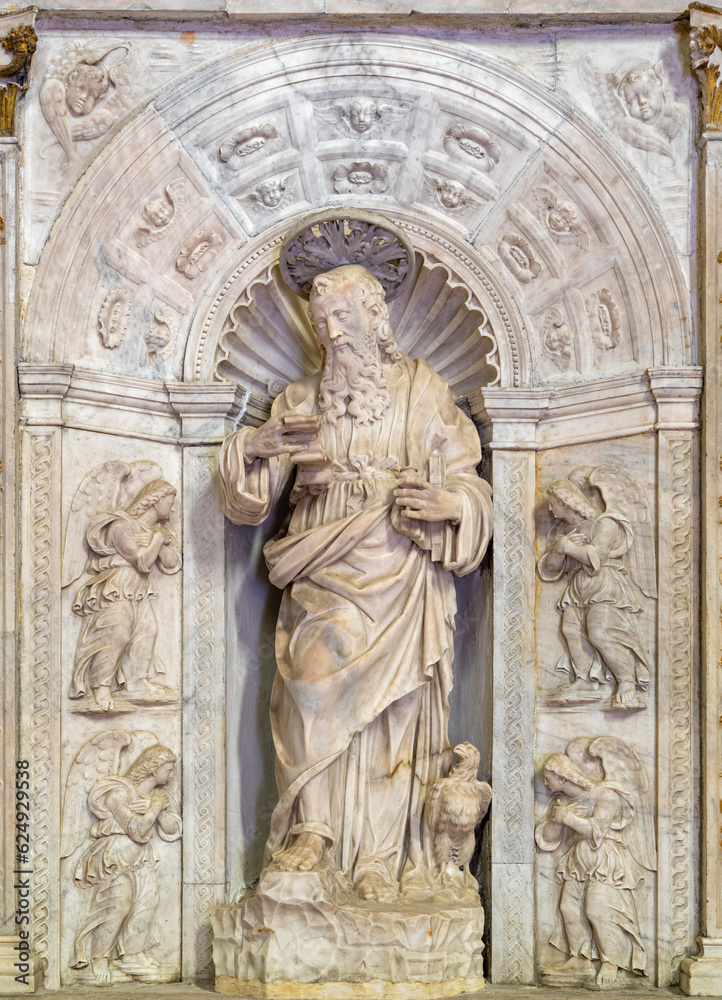 NAPLES, ITALY - APRIL 23, 2023: The marble renaissance staue of St. John the Evangelist in the church Chiesa di San Giovanni a Carbonara by Annibale Caccavello (1515 - 1570).