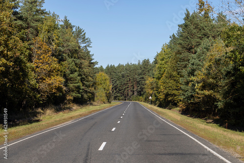 Paved road in the autumn season in sunny weather © rsooll