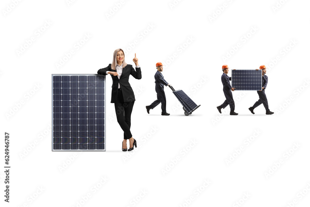 Fototapeta premium Businesswoman and factory workers with photovoltaic panels