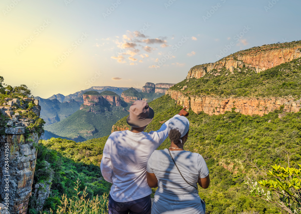 Young tourists are enjoying the view at Blyde River Canyon, Panorama Route, Graskop, Mpumalanga, South Africa