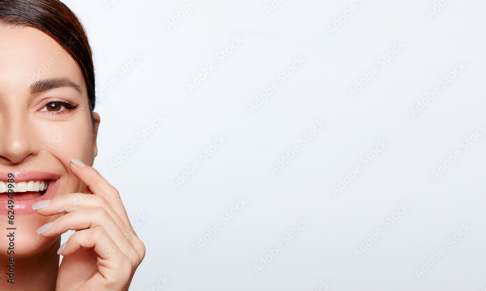 Natural Beauty. Close-up of a Latin woman's face with a captivating smile, emphasizing her flawless and healthy skin