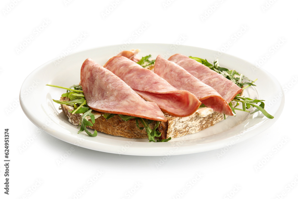 Tasty ham bruschetta with arugula on white background Tasty ham bruschetta with arugula on white background