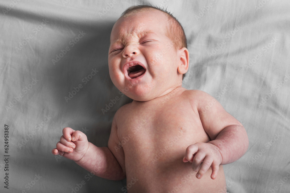 Crying baby 1 month old. Newborn baby colic close up Crying baby 1 month old. Newborn baby colic close up