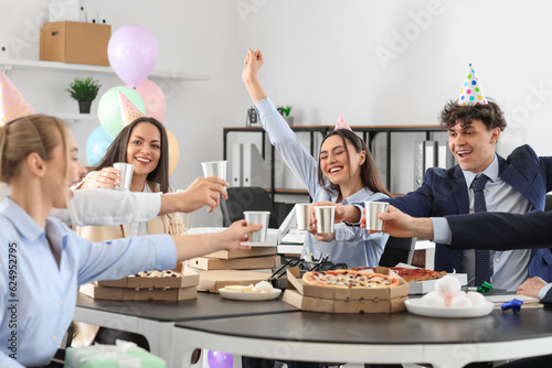 Photography Group of business people drinking at birthday party in office
