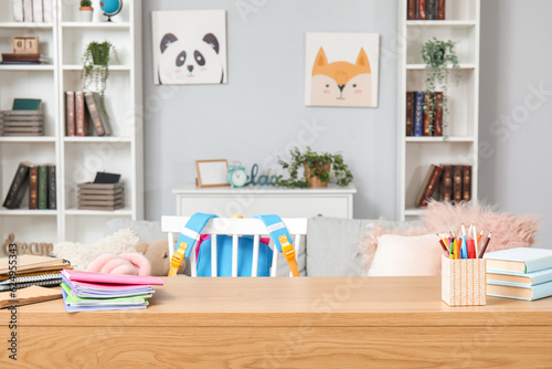 School stationery on table in room