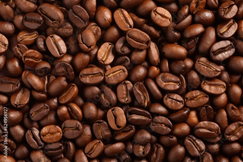  Fresh roasted coffee beans closeup pattern on dark background. Food pattern. Love coffee concept. Top view, flat lay with copy space