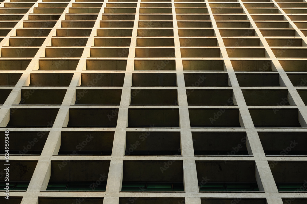 Santiago, Chile - 14 September 2022 - View from below of an office building with window patterns