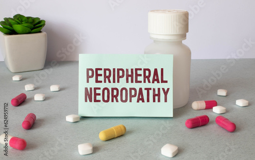 Peripheral Neuropathy - Doctor holding chalkboard with text photo