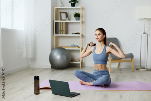 training woman health room lotus home yoga laptop video lifestyle mat