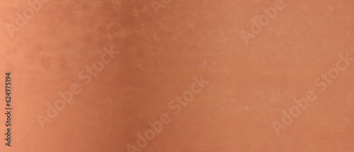 Shiny bronze surface as background, closeup view