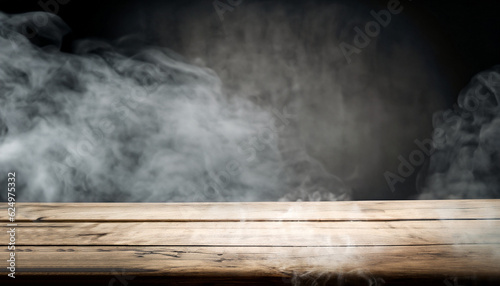 Dark empty wooden table with smoke float up on dark wall background. Free space for your decoration.