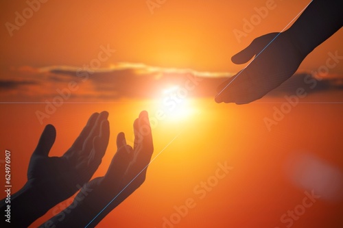 Giving a helping human hand on the sunset background