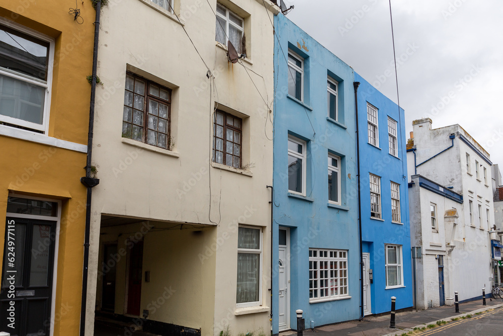 Colourful row of old terraced townhouses in a British seaside town